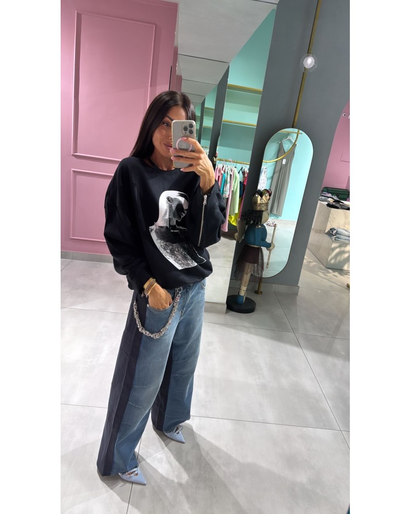 jeans bicolor con catena