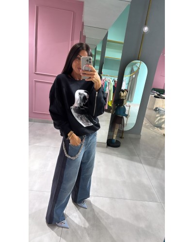 jeans bicolor con catena