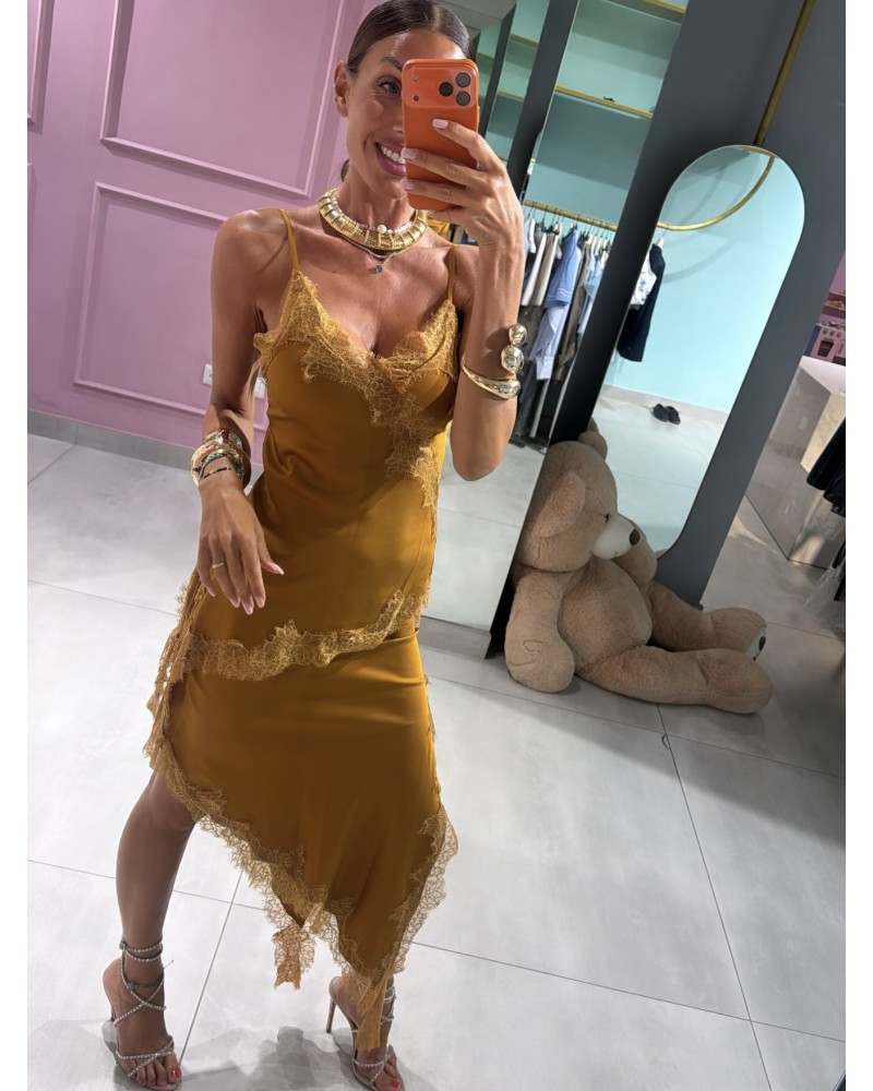Top asimmetrico con pizzo