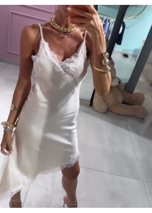 Abito asimmetrico con pizzo