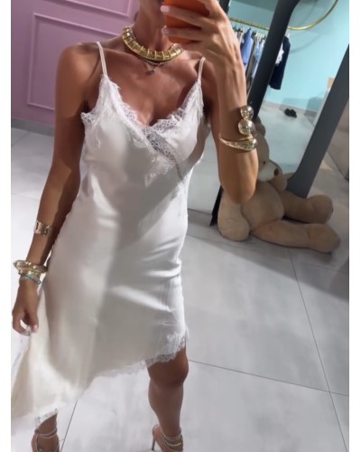 Abito asimmetrico con pizzo